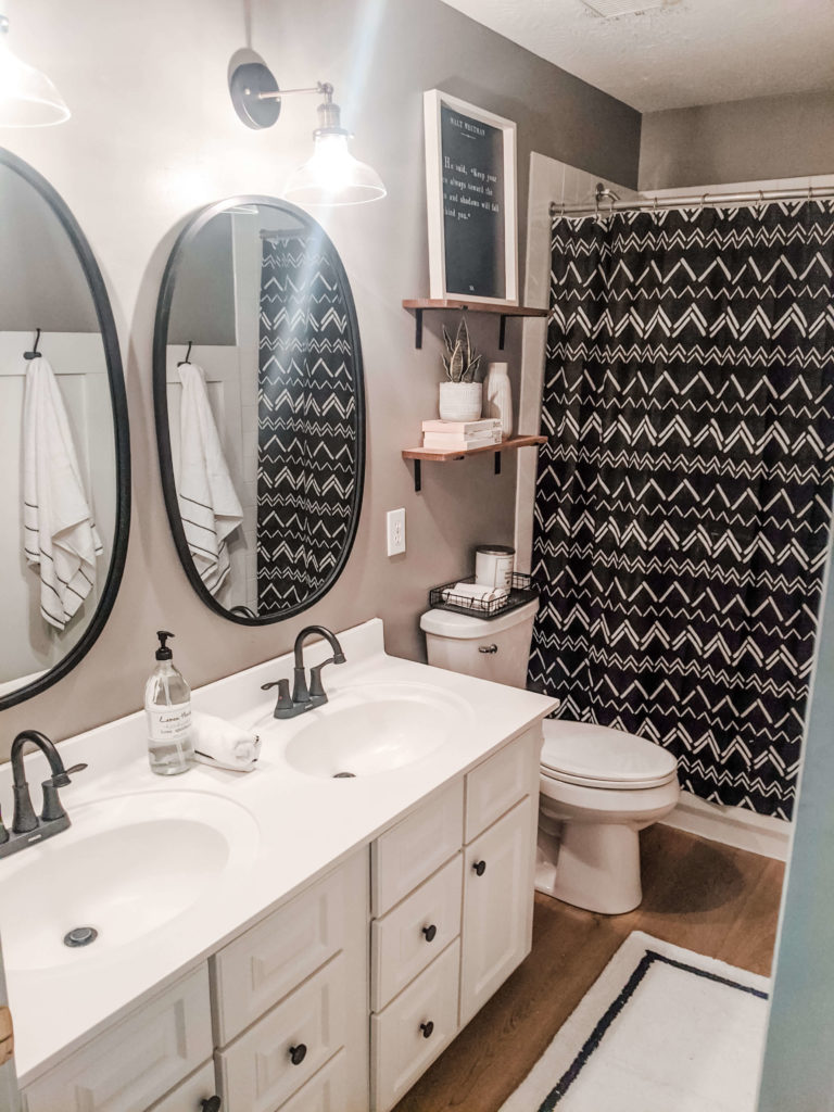https://peaceandpinedesigns.com/wp-content/uploads/2020/04/peace-and-pine-designs-black-and-white-amazon-bathroom-11-768x1024.jpg